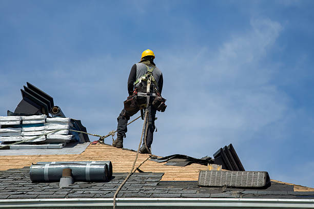 Professional Gutter Installation technician working in Braxton, MS